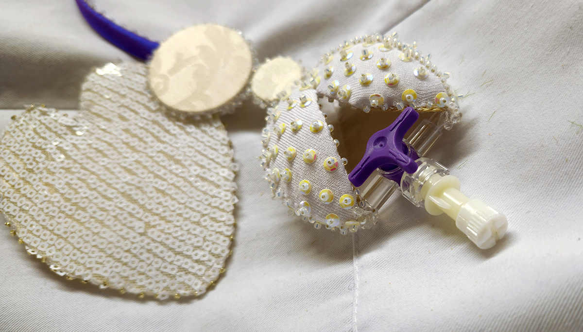 Water Lily, made of white fabrics, sequins and IV tube,